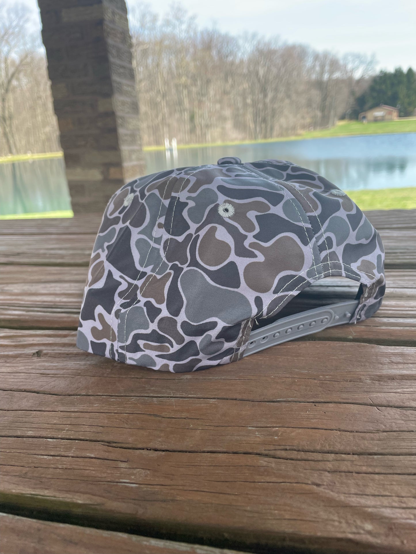 I’m about to cause a scene camo SnapBack hat