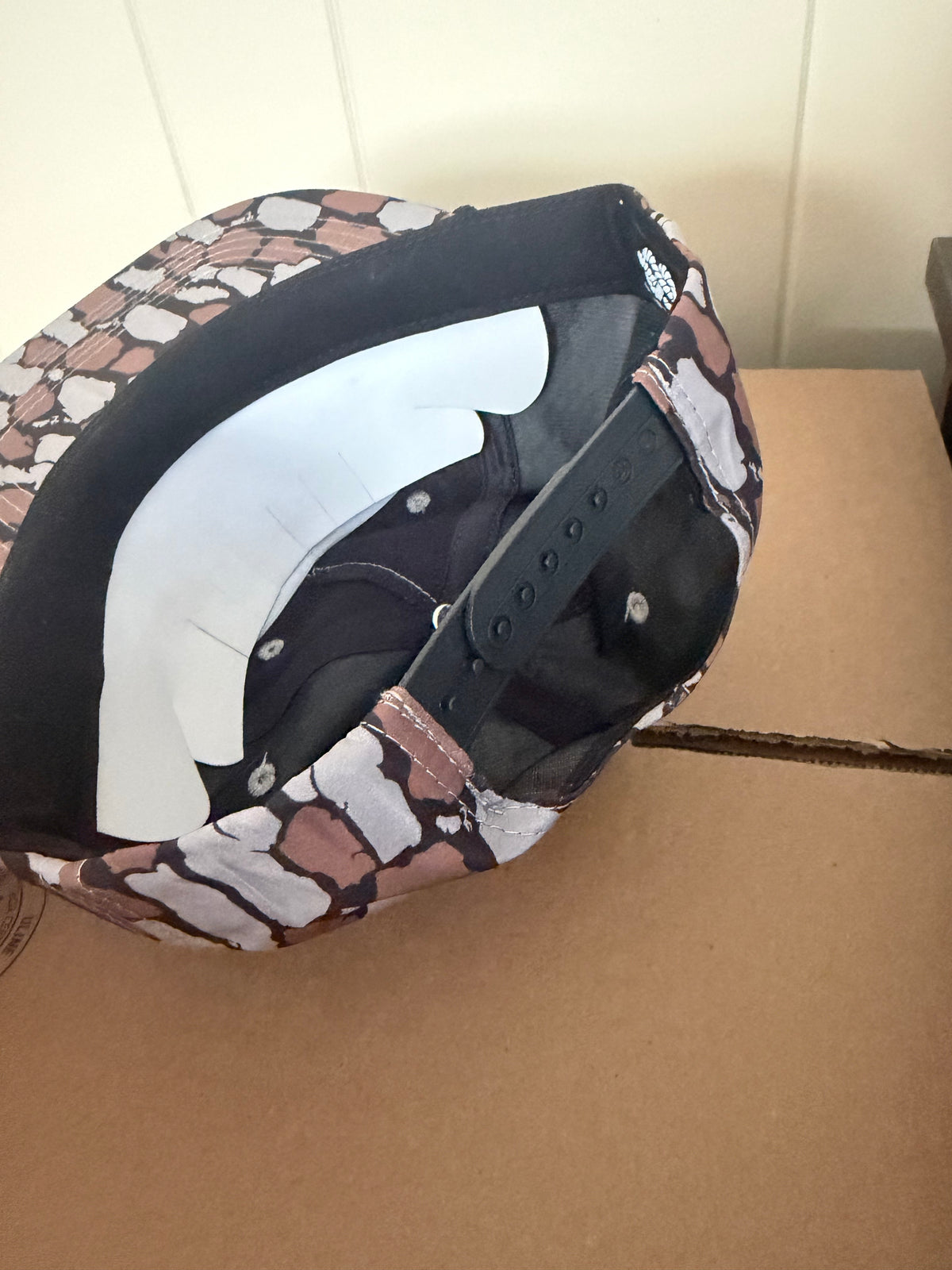 STIHL chainsaw patch on a oak camo ropebrim SnapBack hat