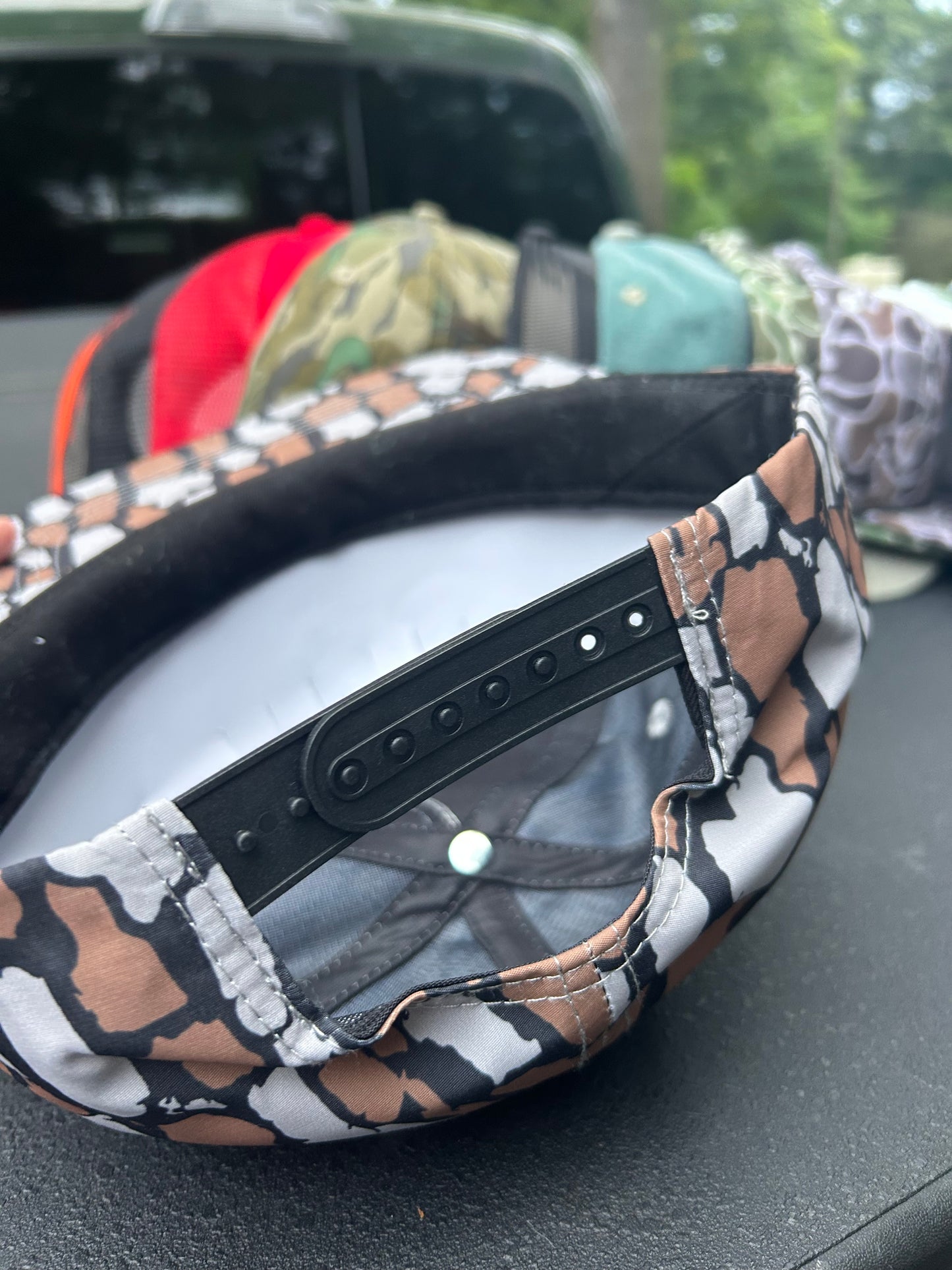 Banjo Brand smokin’whitetail patch on a oak Camo rope brim snapback hat