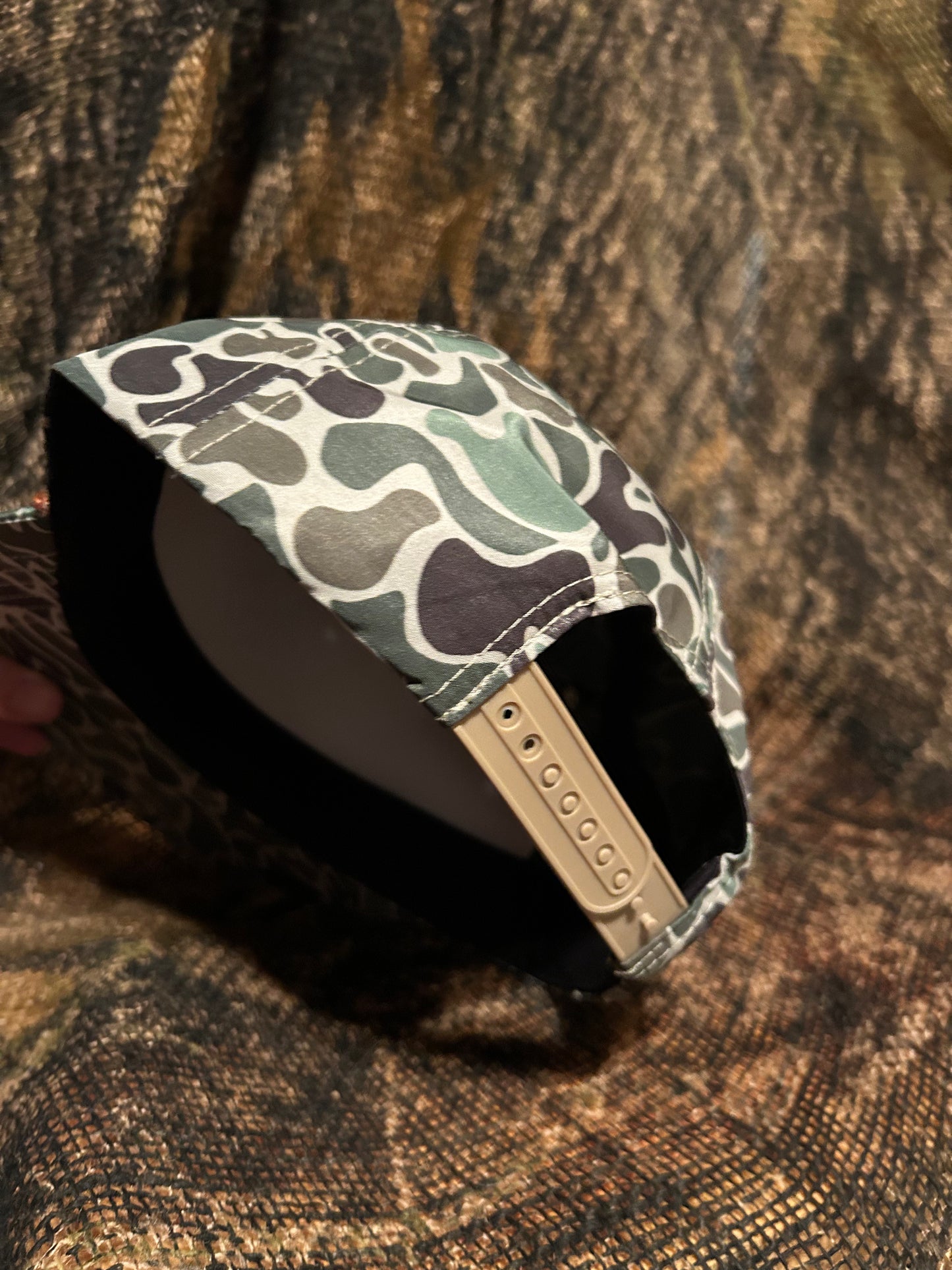 Shooters patch on a Camo SnapBack hat