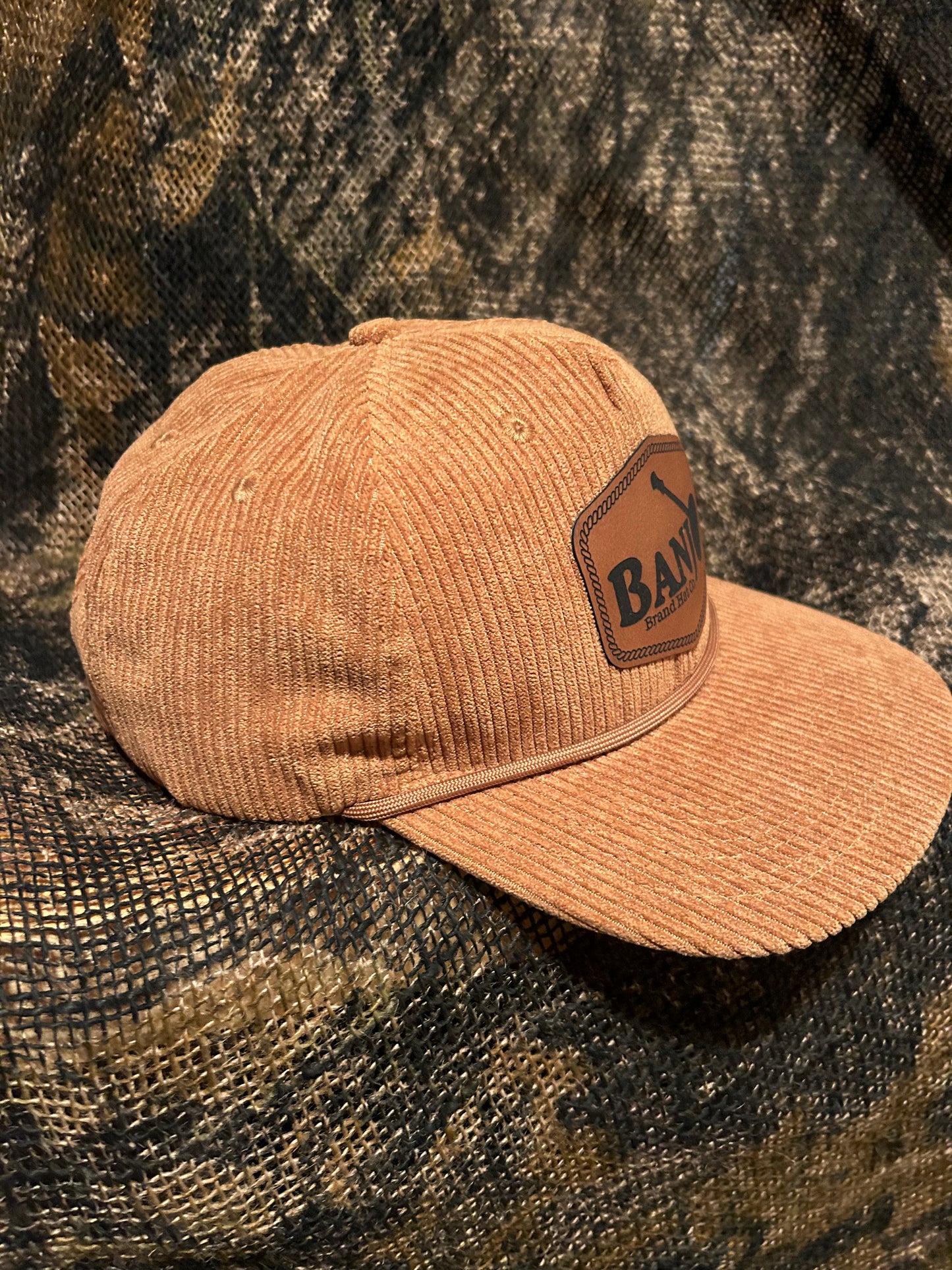 Banjo Brand leather patch on your choice of Corduroy SnapBack hat