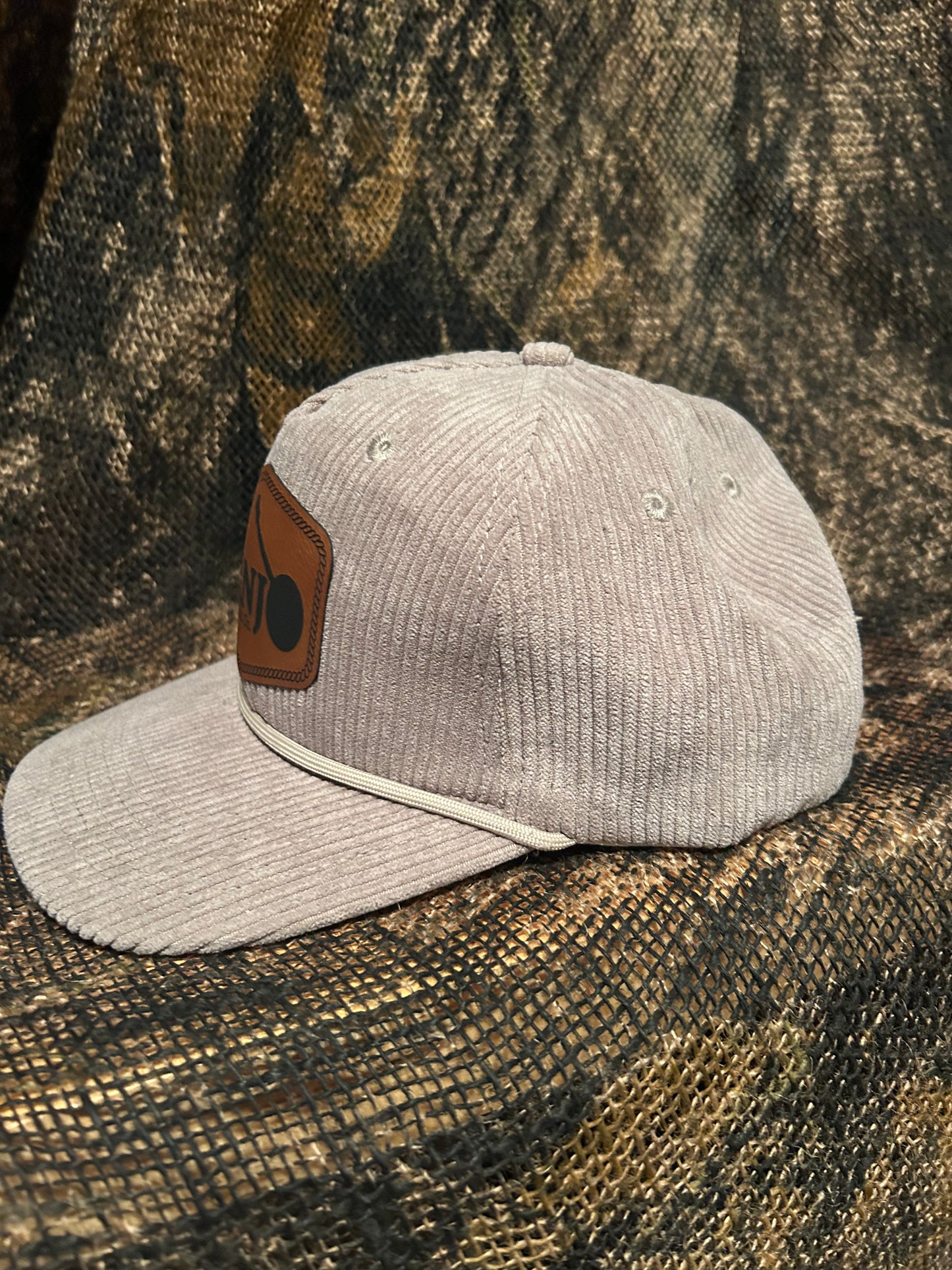 Banjo Brand leather patch on your choice of Corduroy SnapBack hat