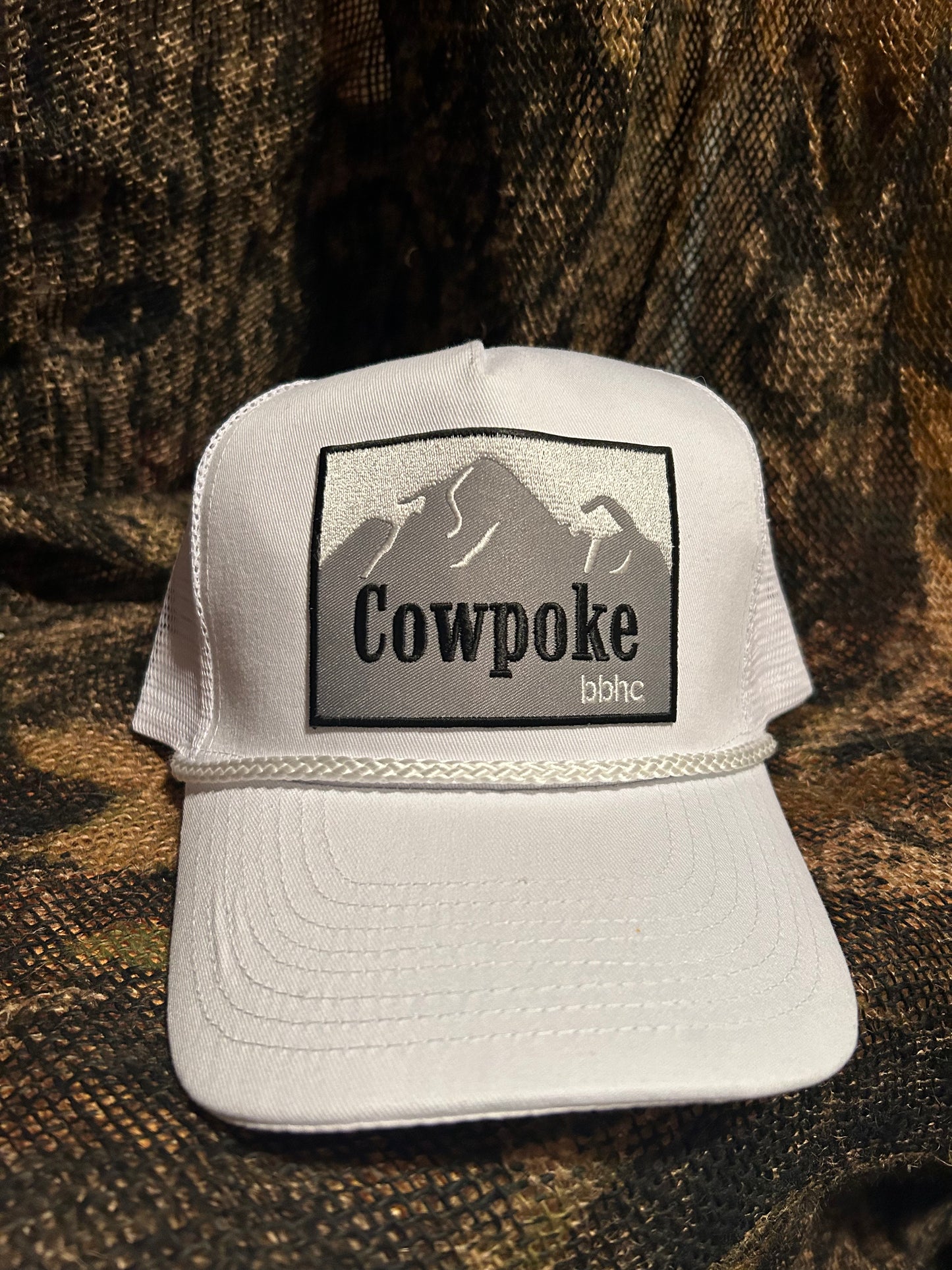 Banjo Brand Cowpoke Patch on off white rope brim snapback hat