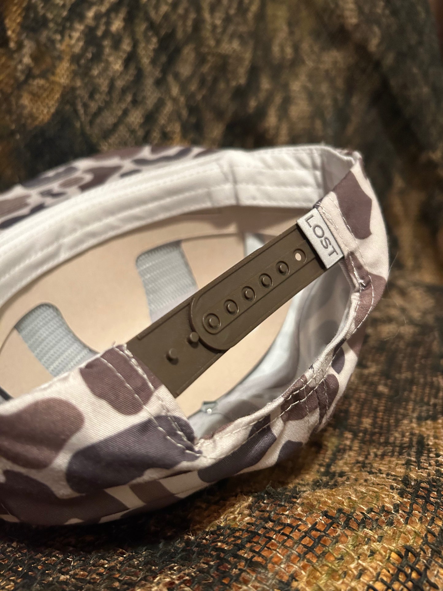 Remington patch on brown Camo ropebrim SnapBack hat