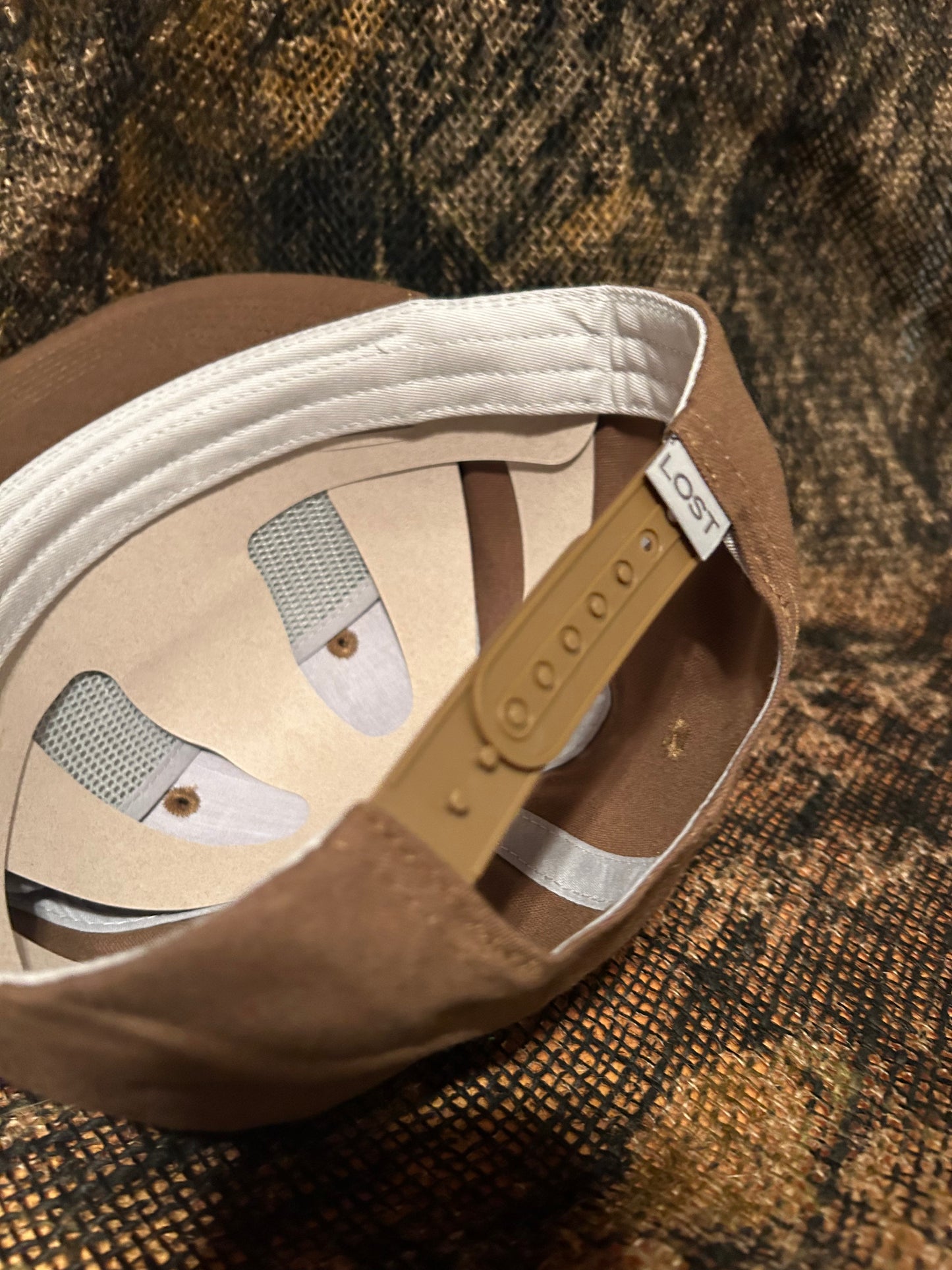 Banjo Brand script patch on a tobacco brown rope brim SnapBack hat