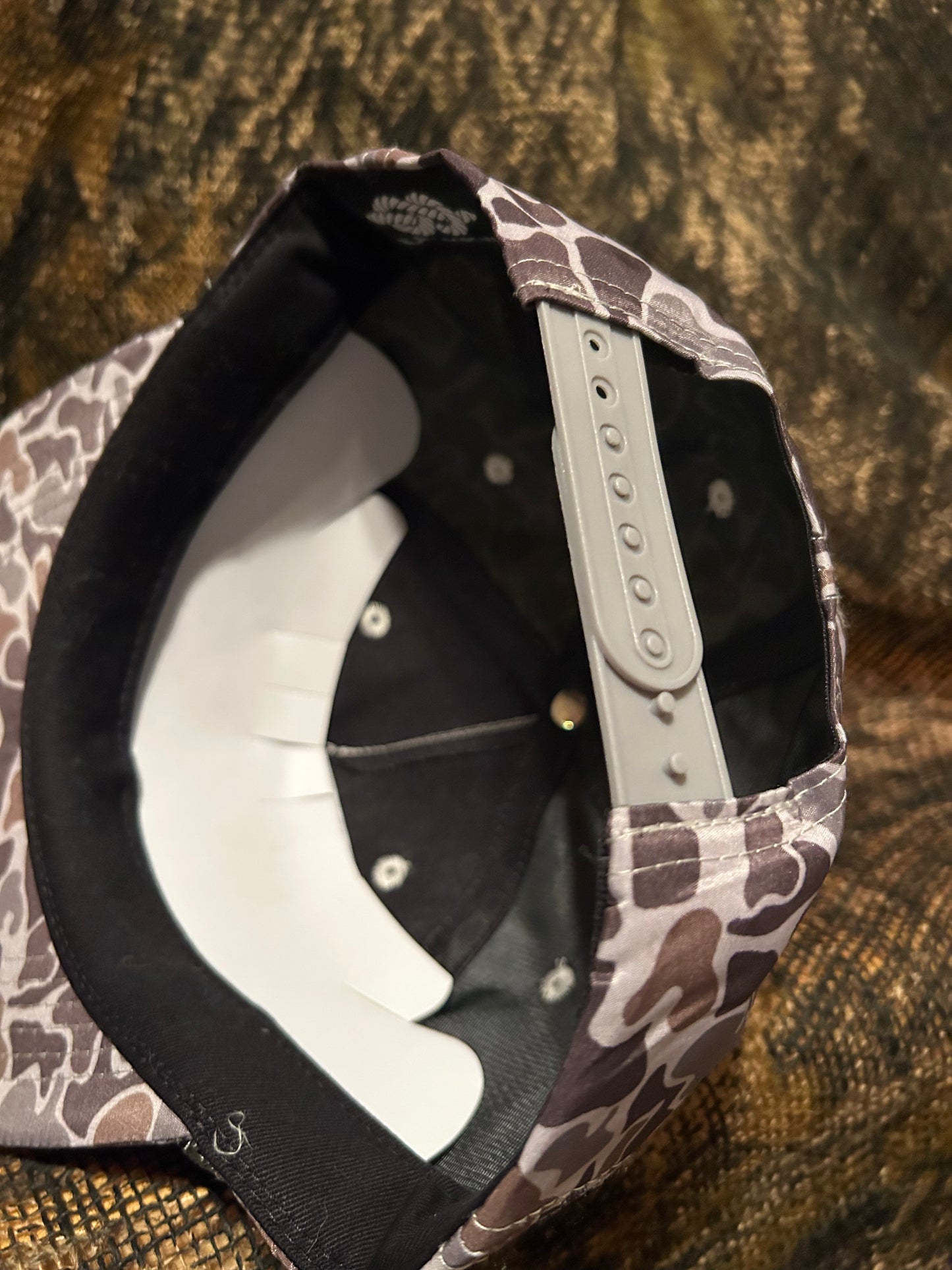 Remington patch on a Smokeshow ropebrim SnapBack hat