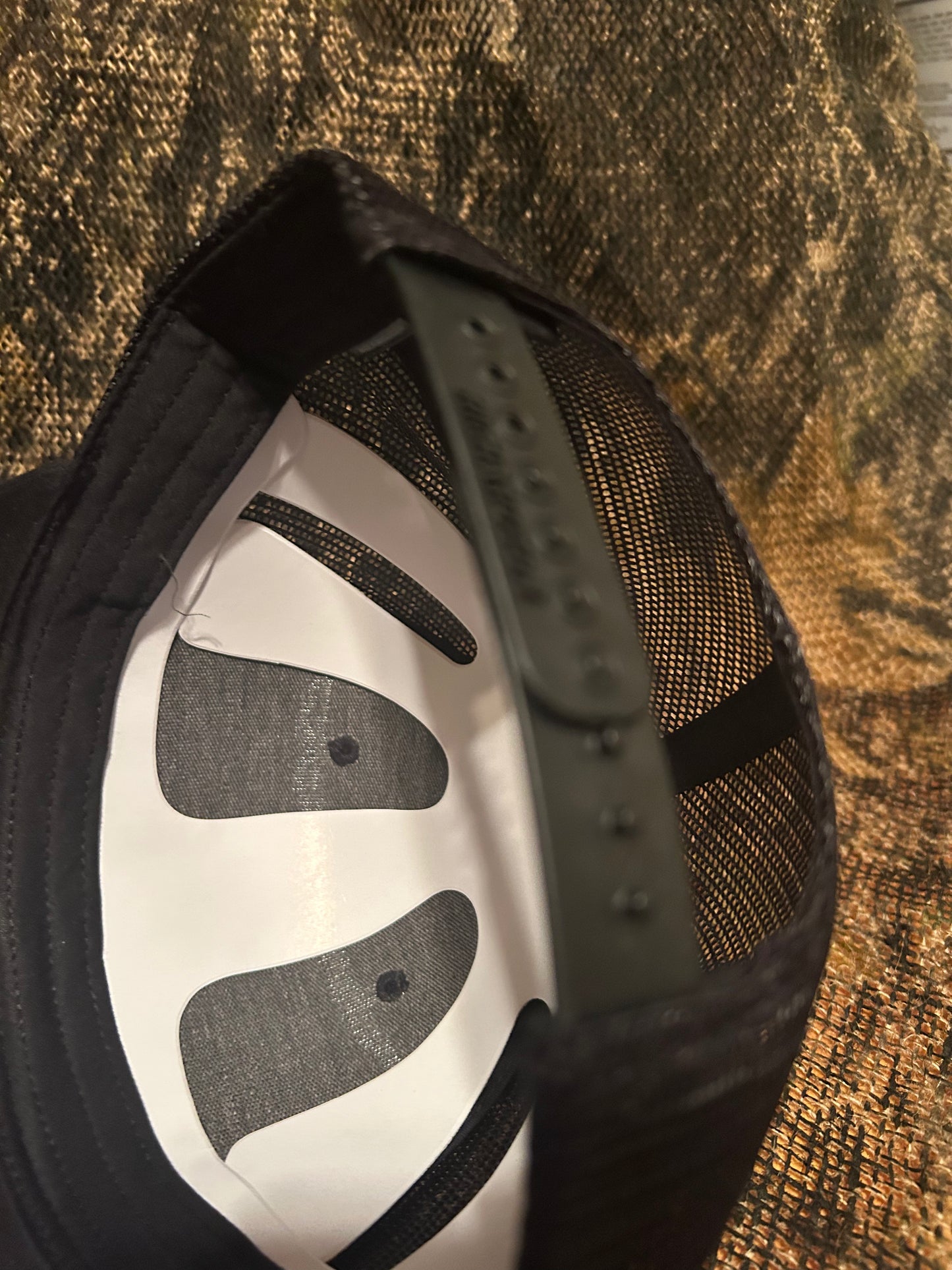 Vintage Winchester patch on a black Richardson 112 trucker hat