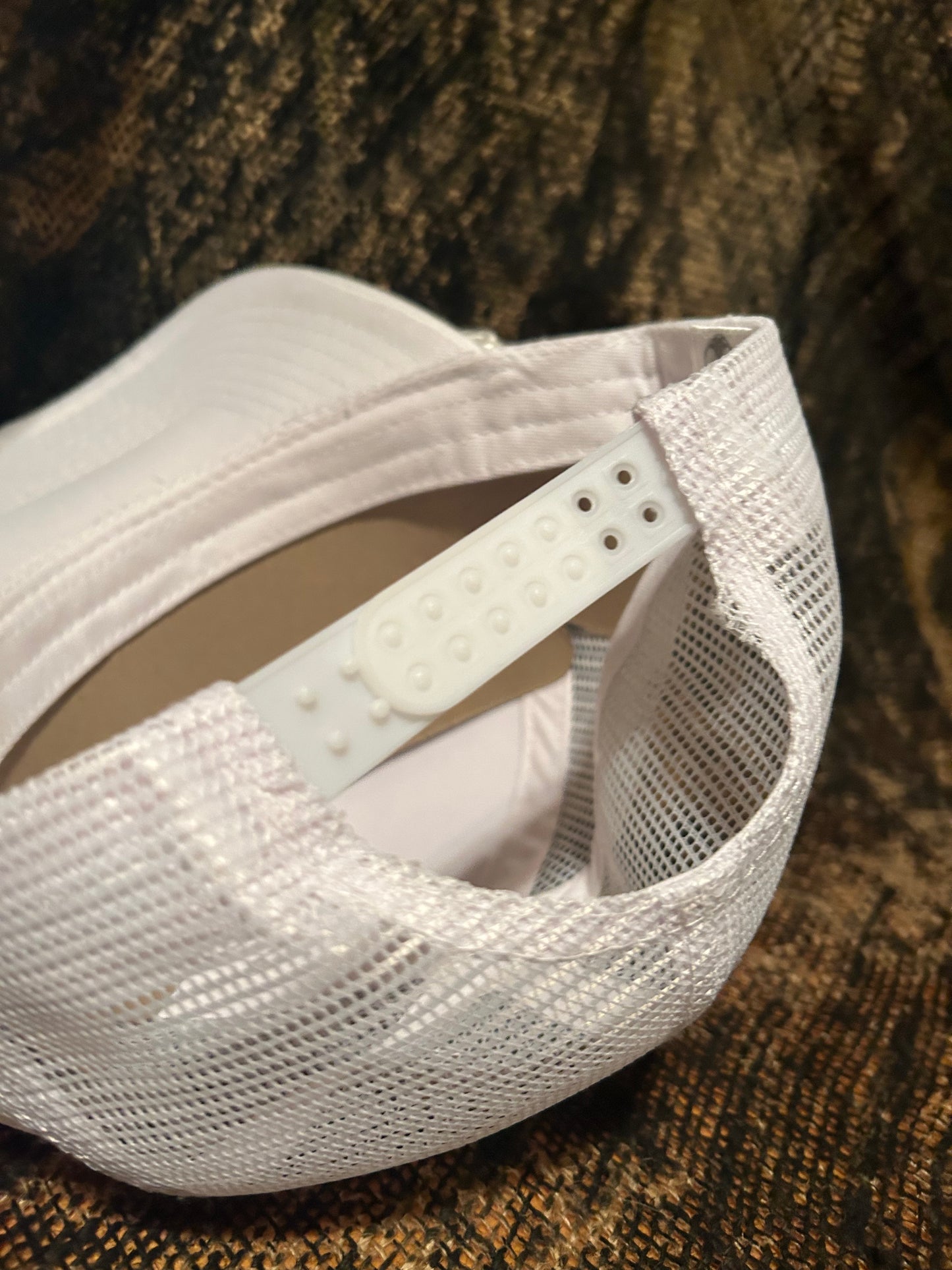 Banjo Brand smokin’whitetail patch on a white white rope brim snapback hat