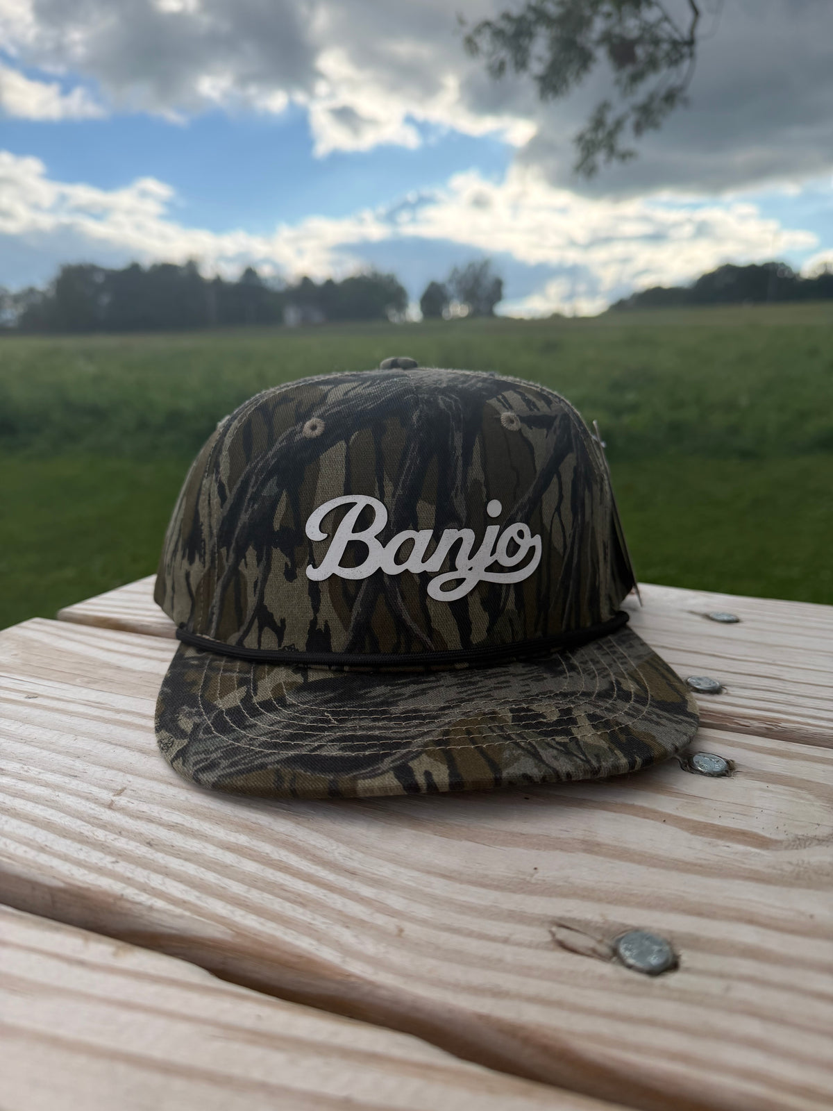 Banjo Cursive font mossyoak treestand camo SnapBack hat