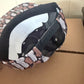 STIHL chainsaw patch on a oak camo ropebrim SnapBack hat