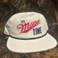 Its Miller Time retro vintage patch on a white  ropebrim SnapBack