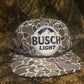 Busch Light retro vintage patch on a smokeshow Camo ropebrim SnapBack