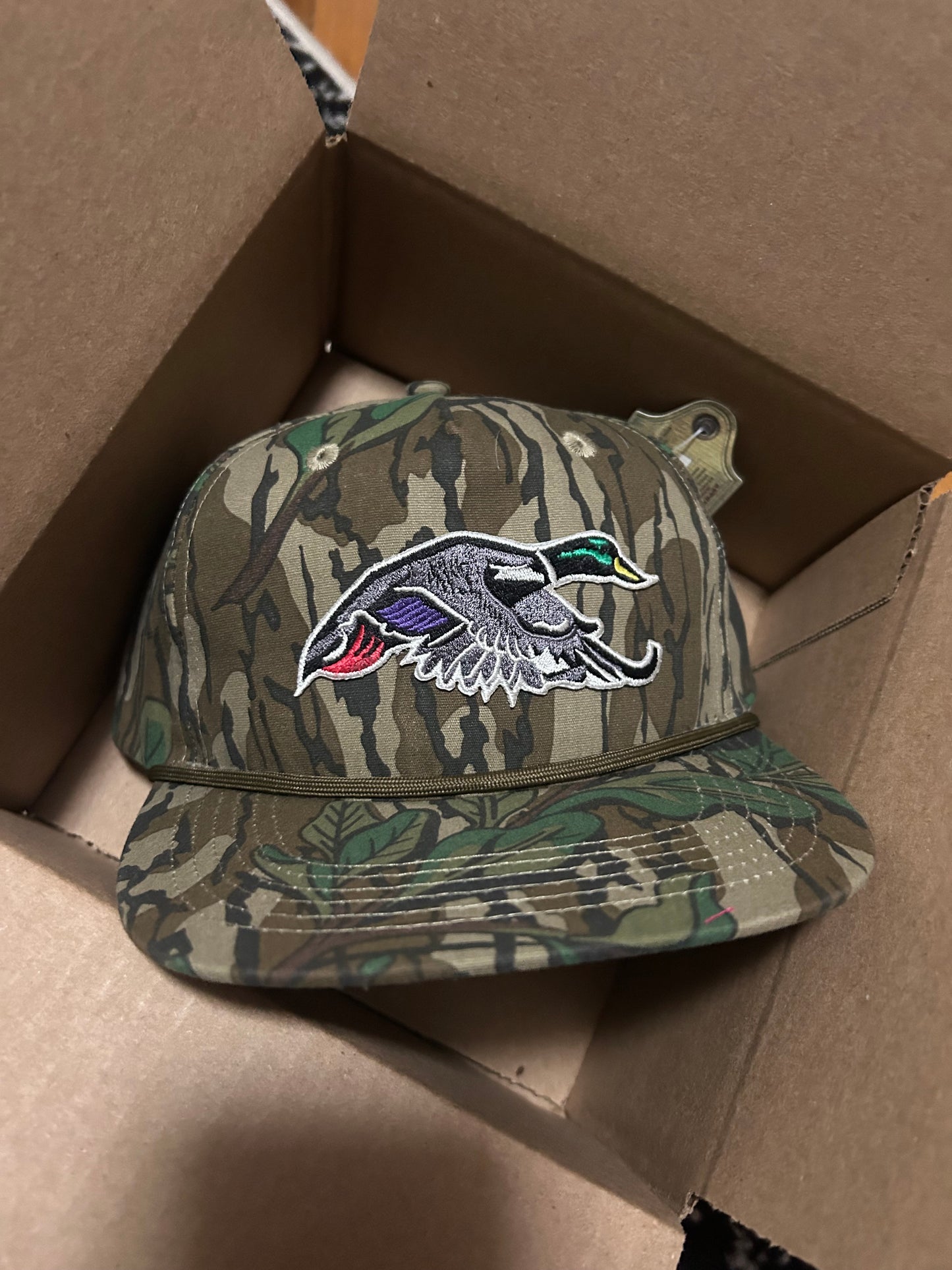 Mallard duck patch on a mossy oak greenleaf Camo Rope brim SnapBack Hat