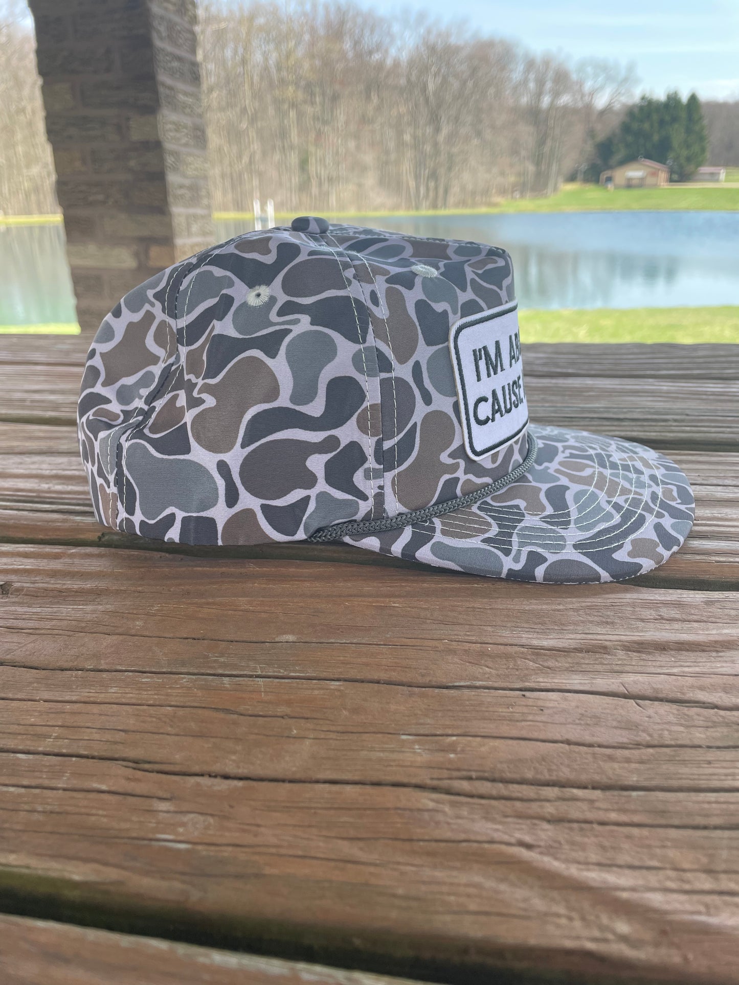 I’m about to cause a scene camo SnapBack hat
