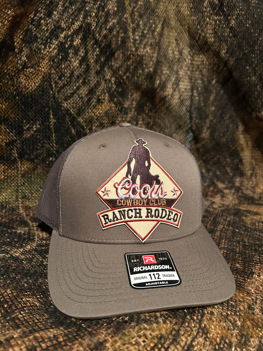 Coors Cowboy club Ranch rodeo patch on a olive green Richardson 112 trucker hat