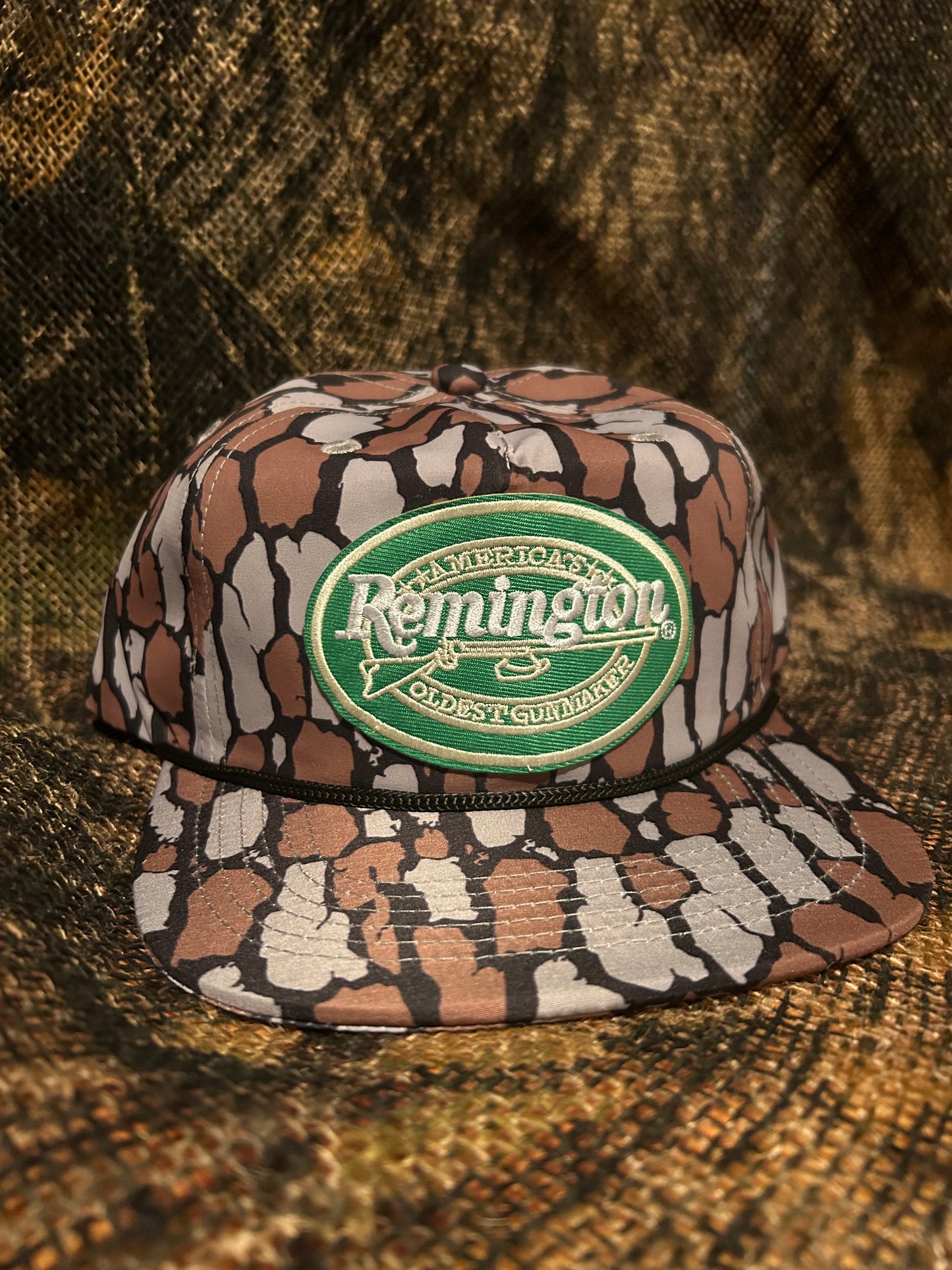 Remington patch on a Oak Camo ropebrim SnapBack hat