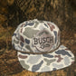 Busch Latte patch on a Camo ropebrim SnapBack