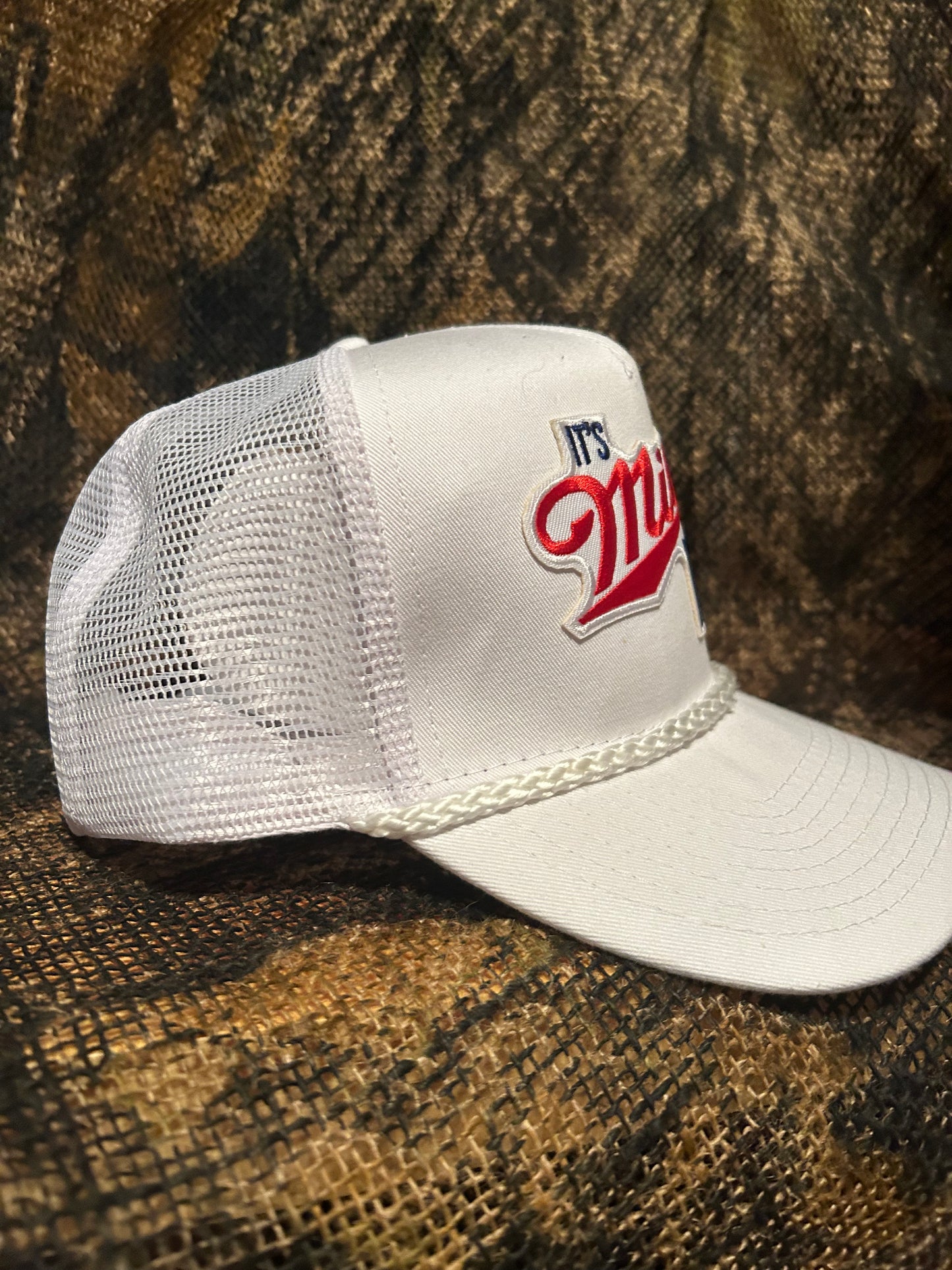 It’s Miller Time patch on a all white Ropebrim SnapBack trucker hat