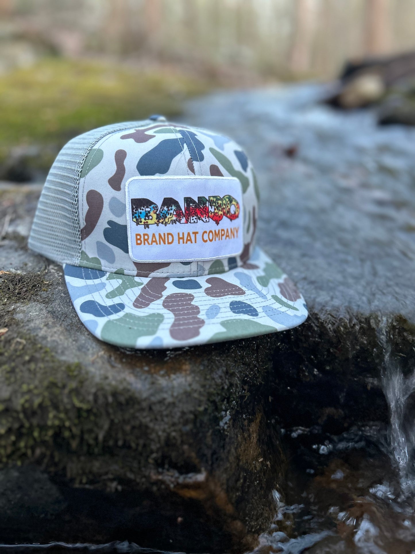 Banjo Brand Trout fishing Camo trucker hat