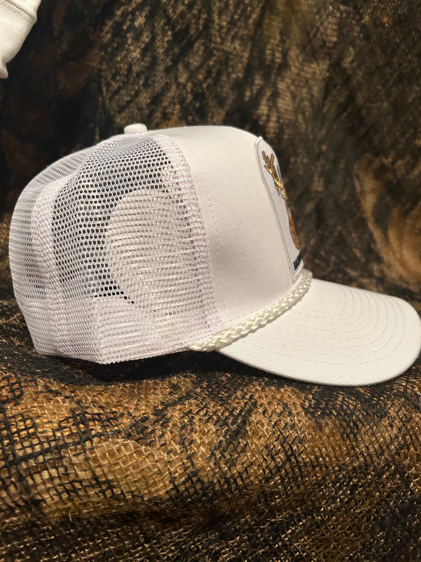 Banjo Brand smokin’whitetail patch on a white white rope brim snapback hat