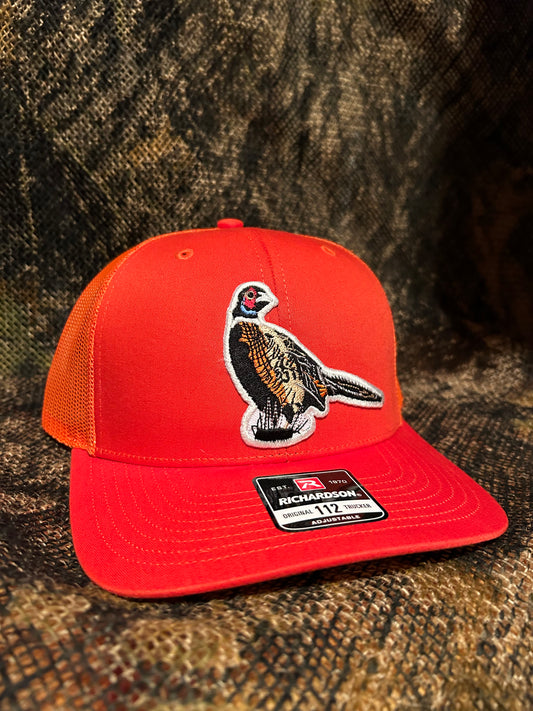 Pheasant patch on a Richardson 112 orange trucker